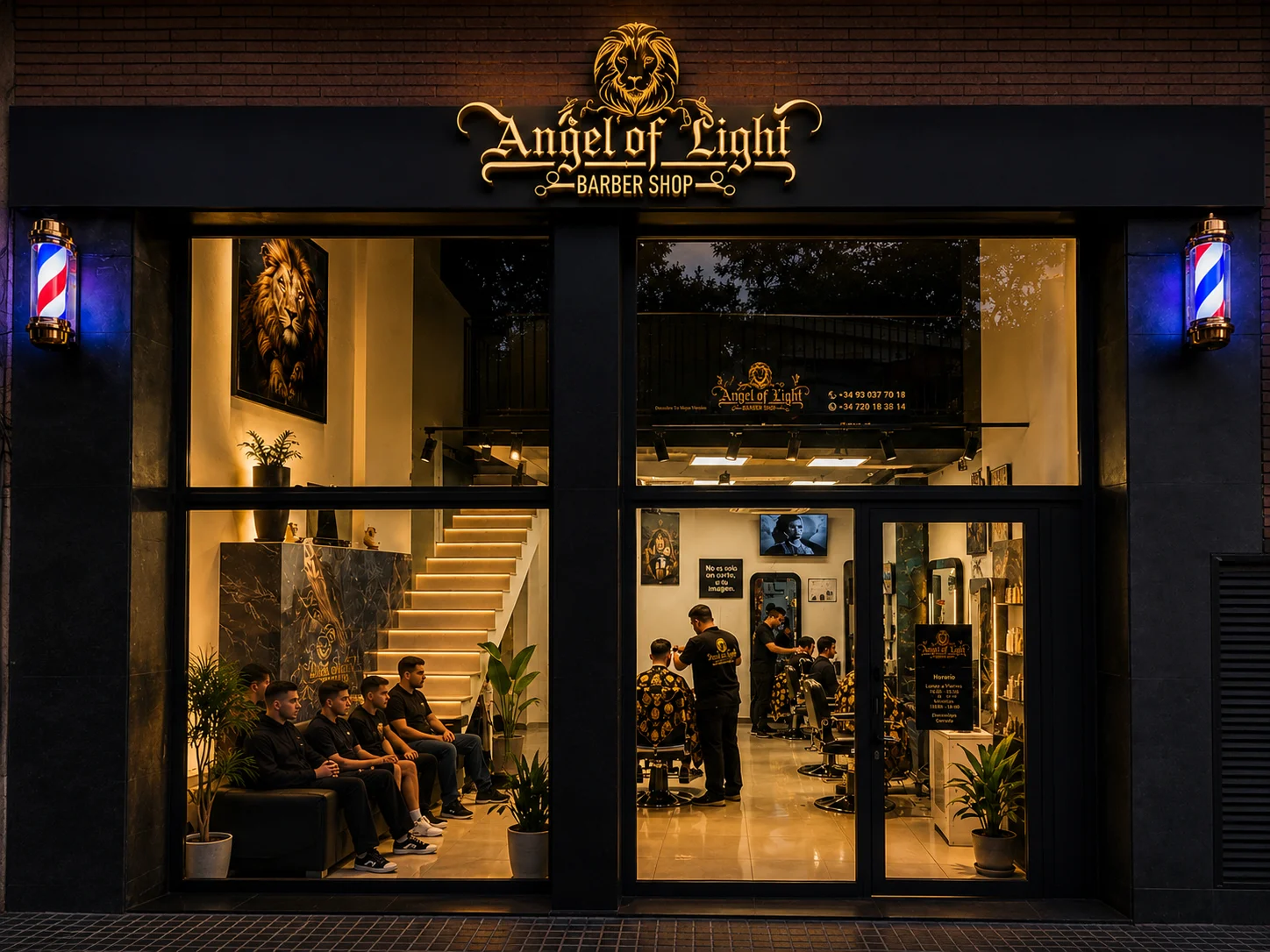 Ángel of Light Barber Shop en Horta-Guinardó, Barcelona: fachada iluminada, barber poles y el equipo trabajando dentro
